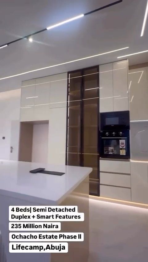 A picture of a kitchen with the words 4 beds semi detached duplex smart features