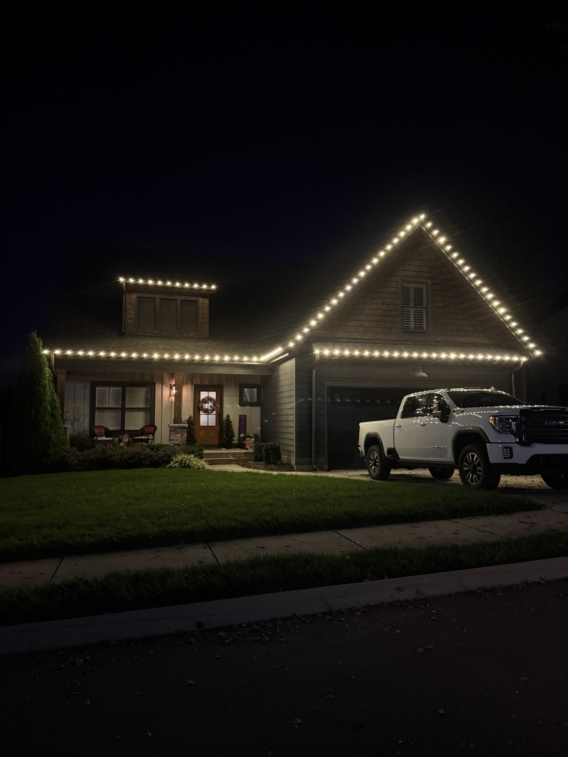 Residential Christmas light installation on home in Cleveland Tennessee