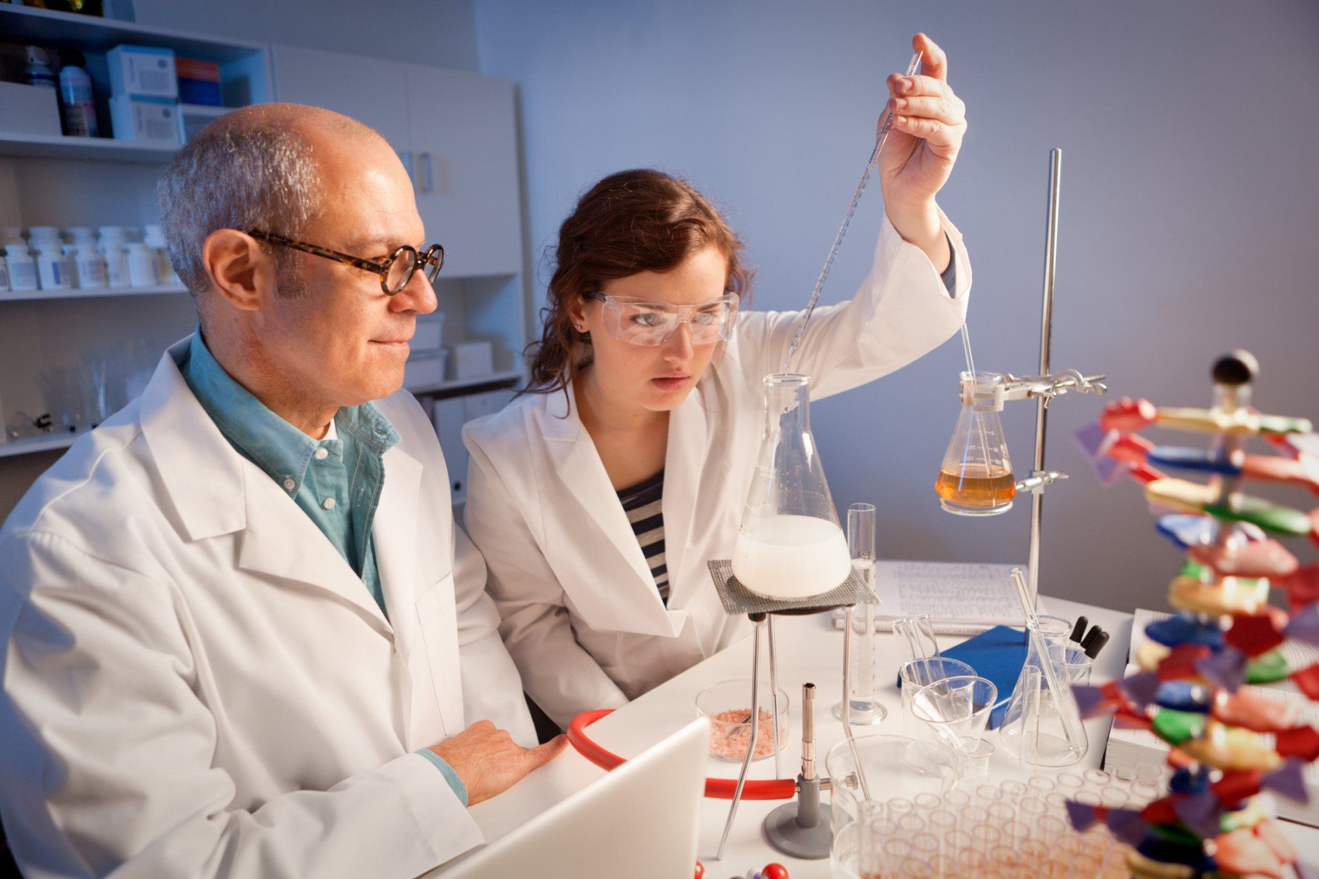 Chemistry Science Student In A Laboratory With Her Teacher — Van Nuys, CA — Aremco Scientific Co.