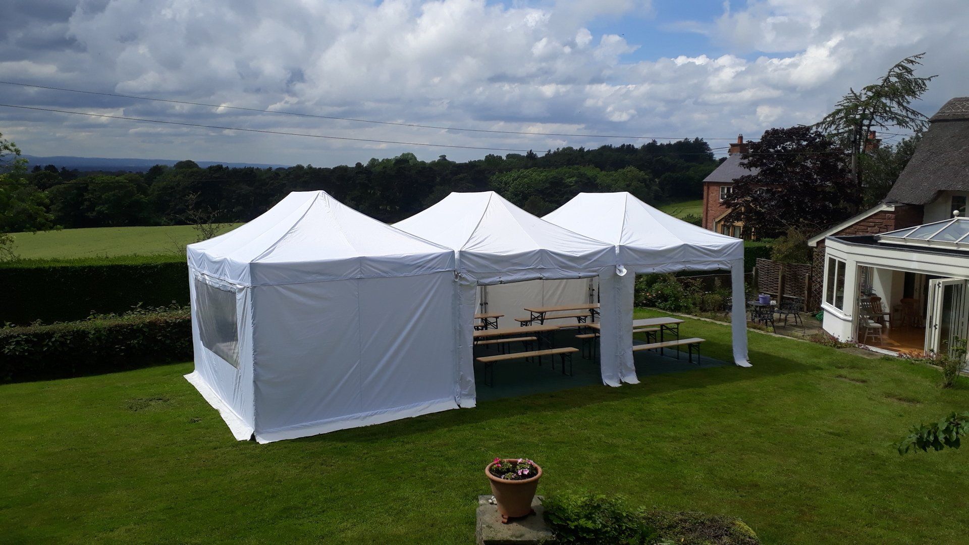 4.5x9m marquee with table & bench sets
