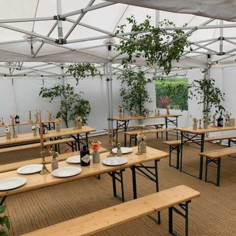 table and bench sets in gazebo on matting flooring