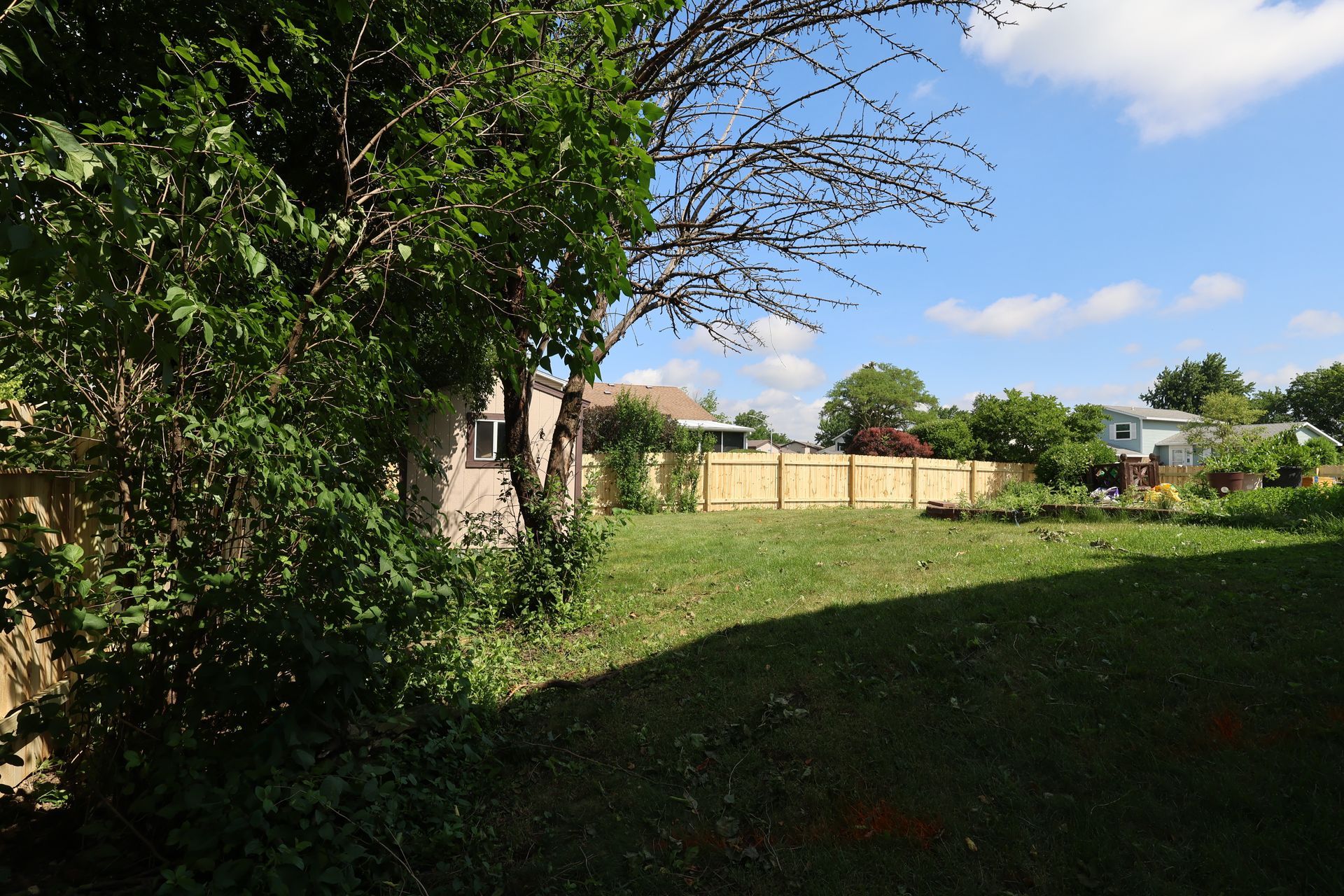 wood fence installation Illinois pressure treated pine shadowbox fencing