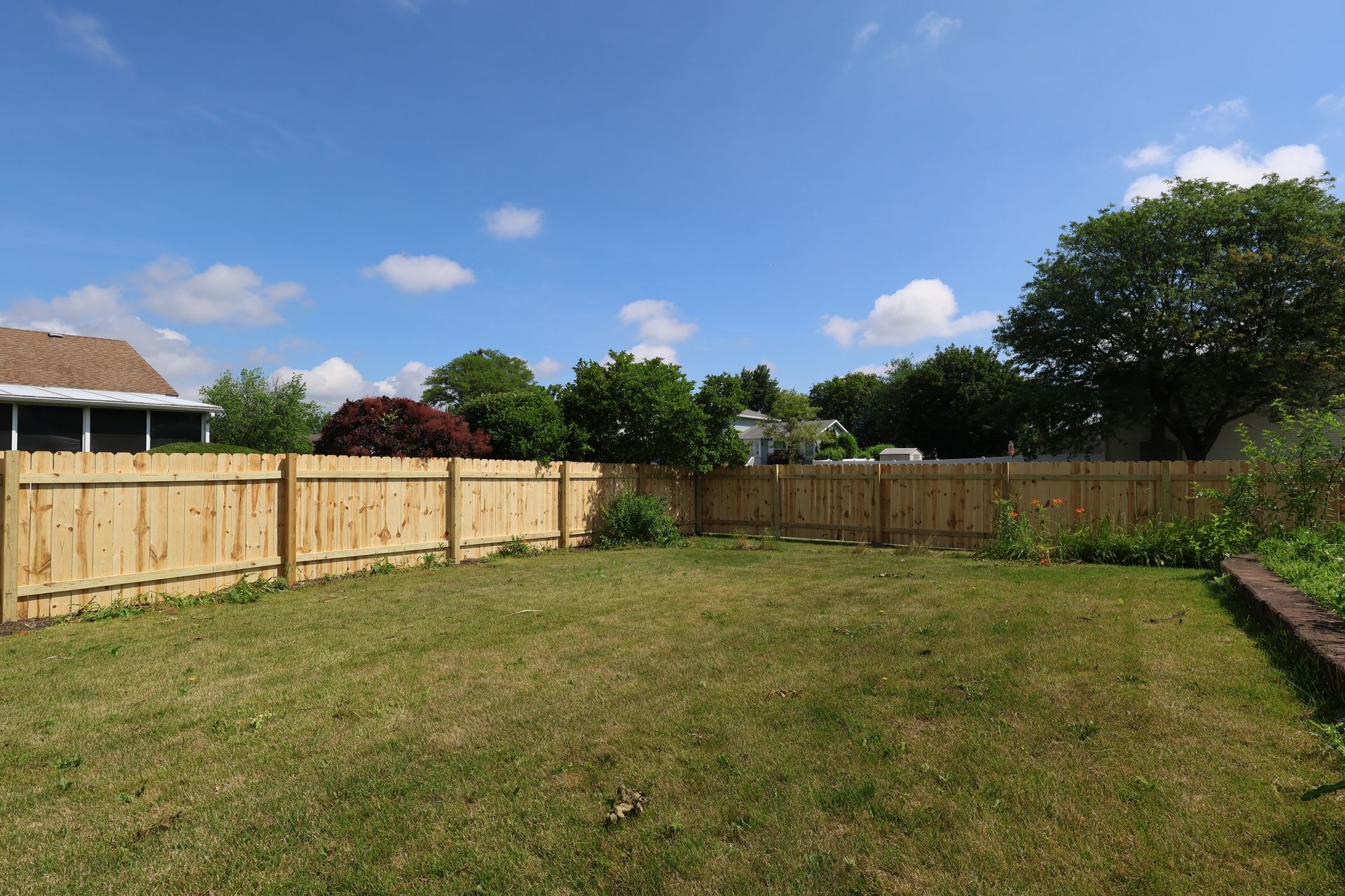 wood fence installation Illinois pressure treated pine shadowbox fencing