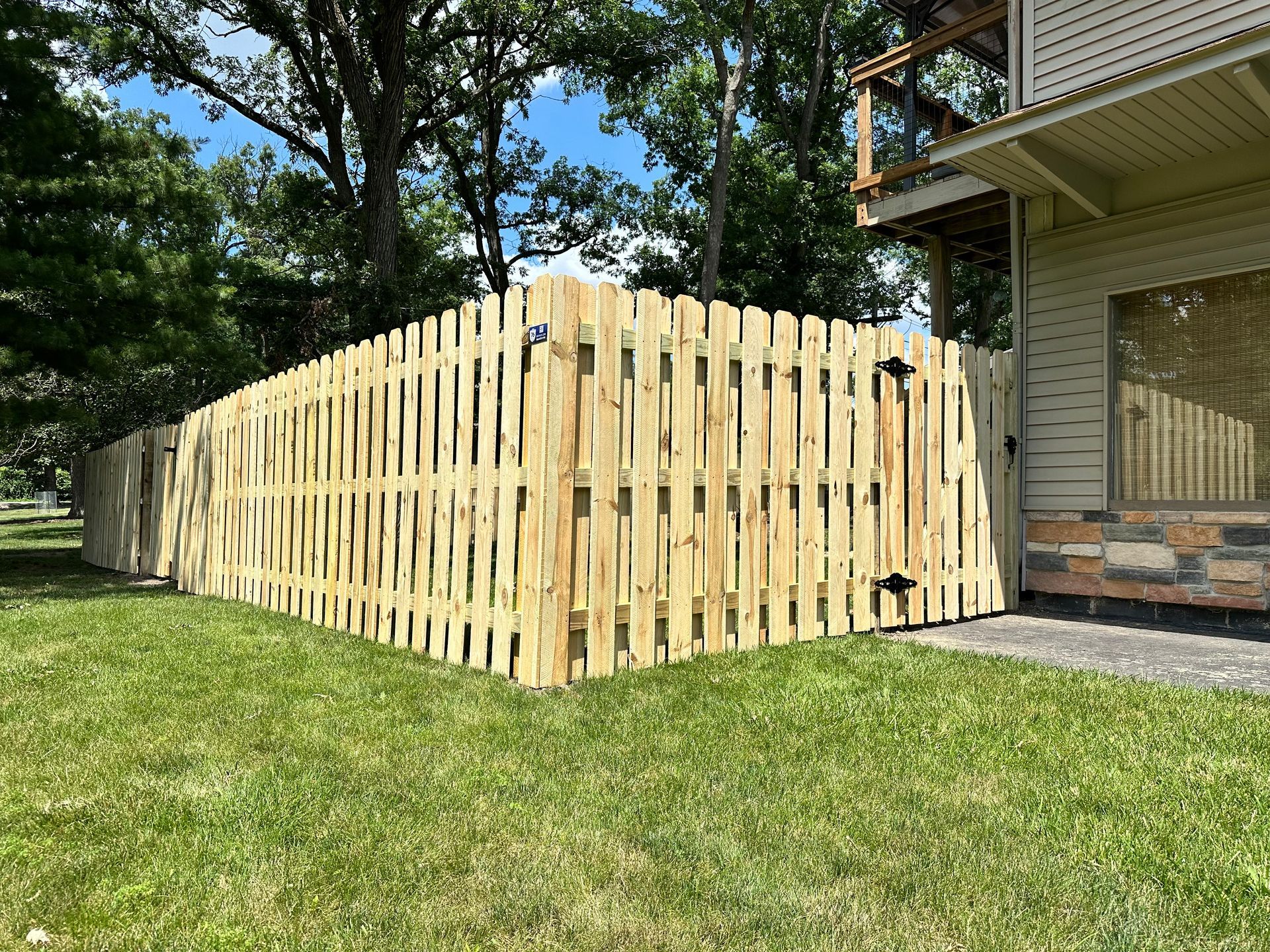 wood fence installation Illinois pressure treated pine shadowbox fencing