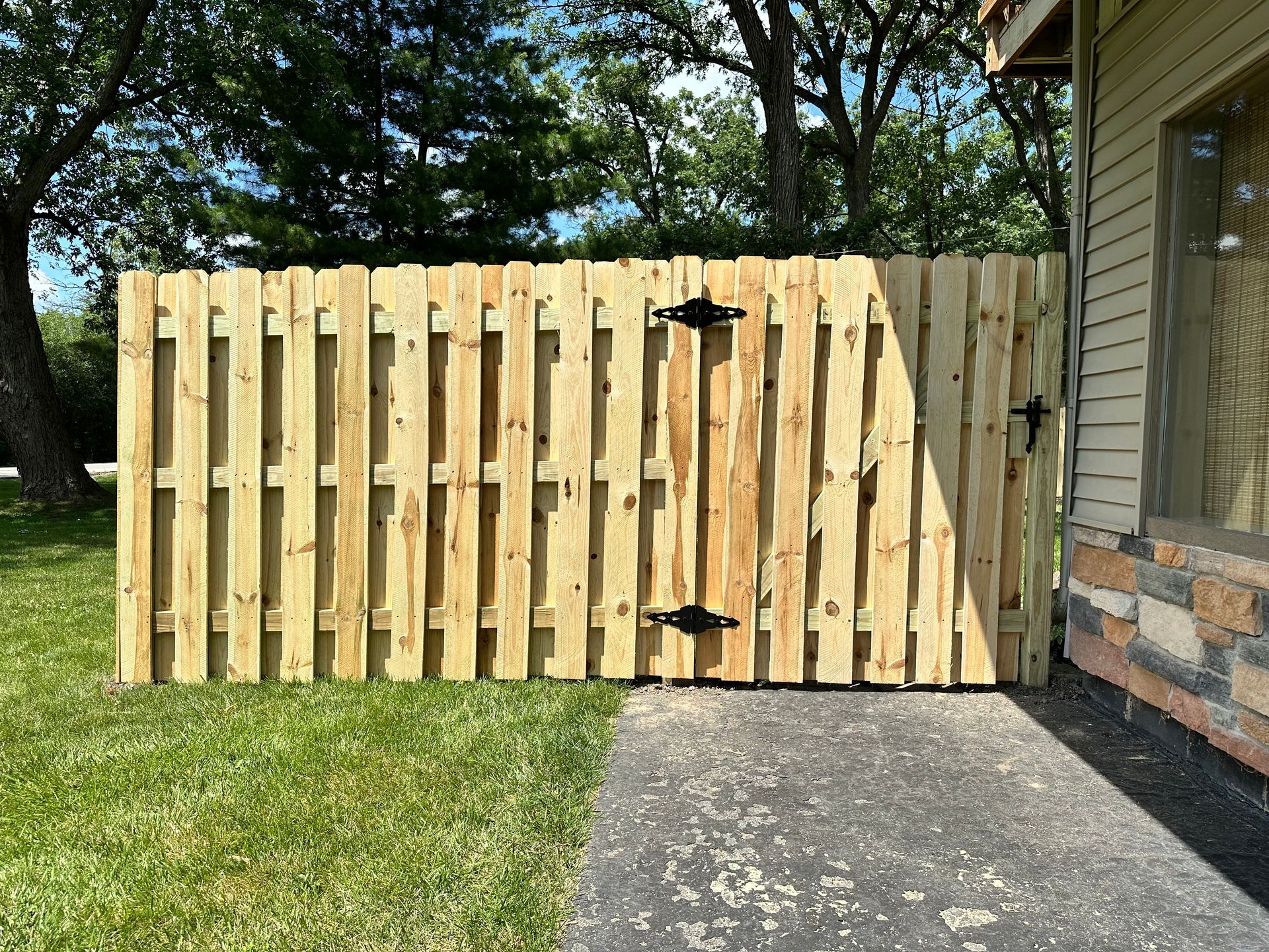 wood fence installation Illinois pressure treated pine shadowbox fencing