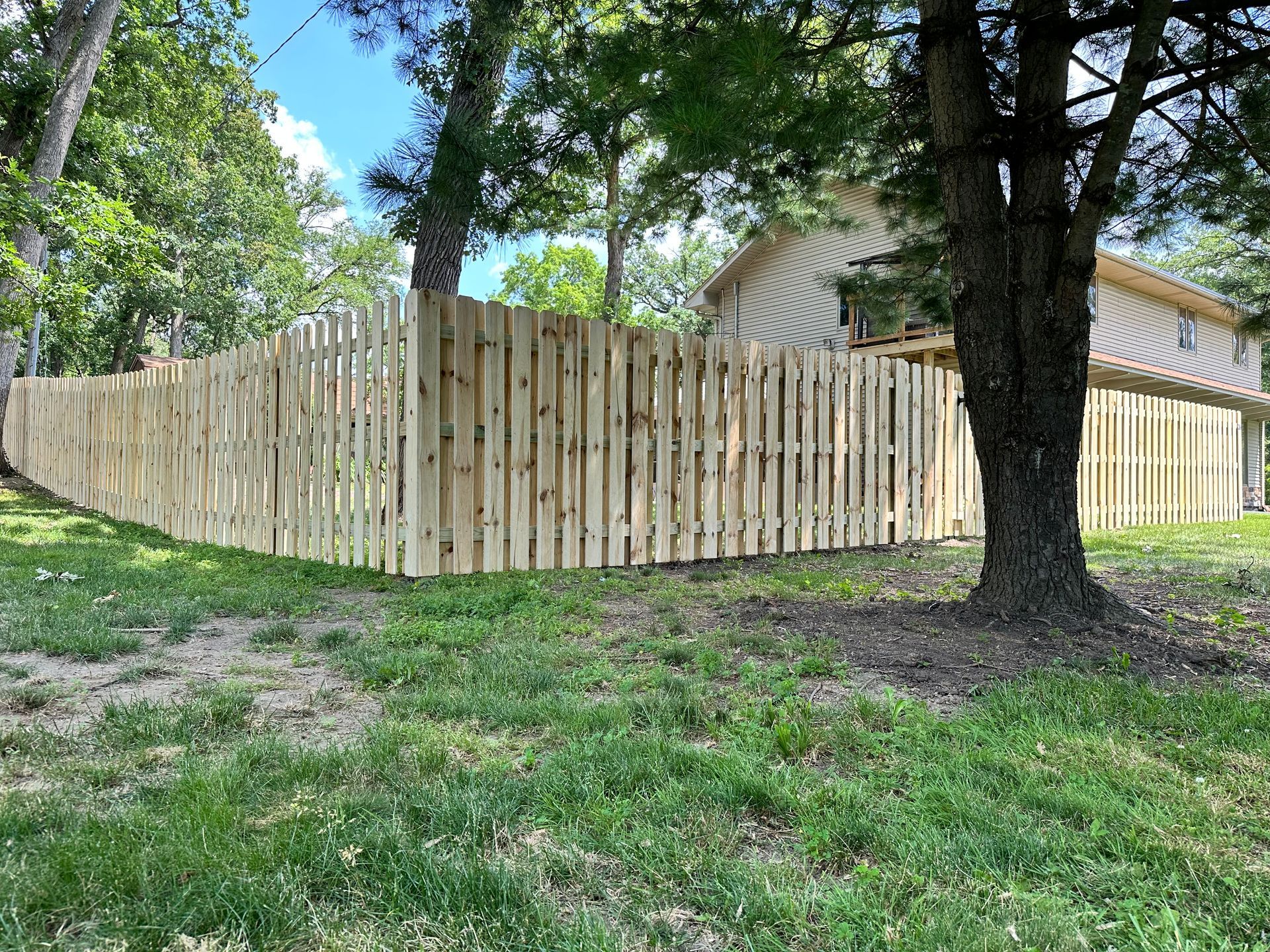 wood fence installation Illinois pressure treated pine shadowbox fencing