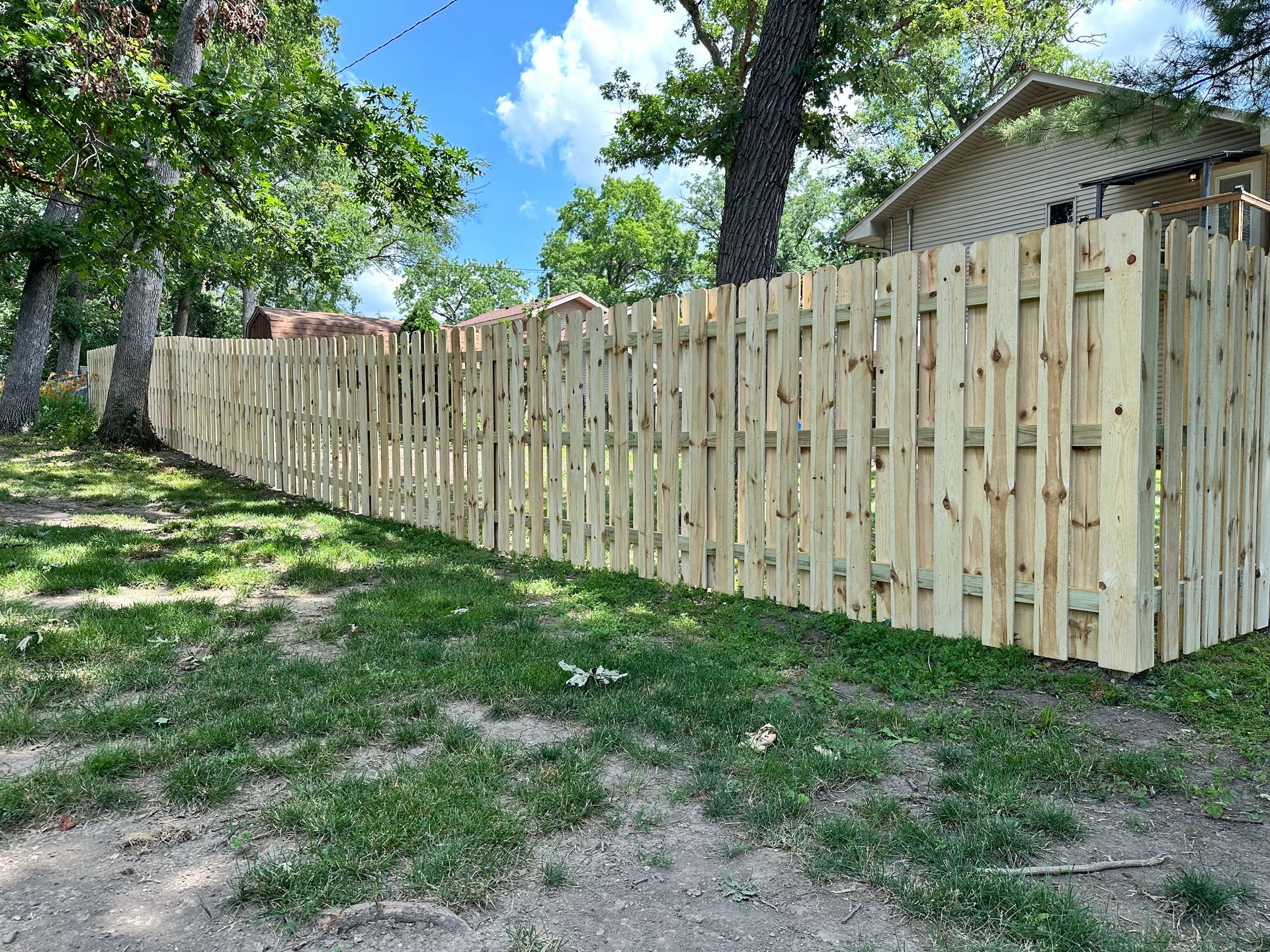 wood fence installation Illinois pressure treated pine shadowbox fencing