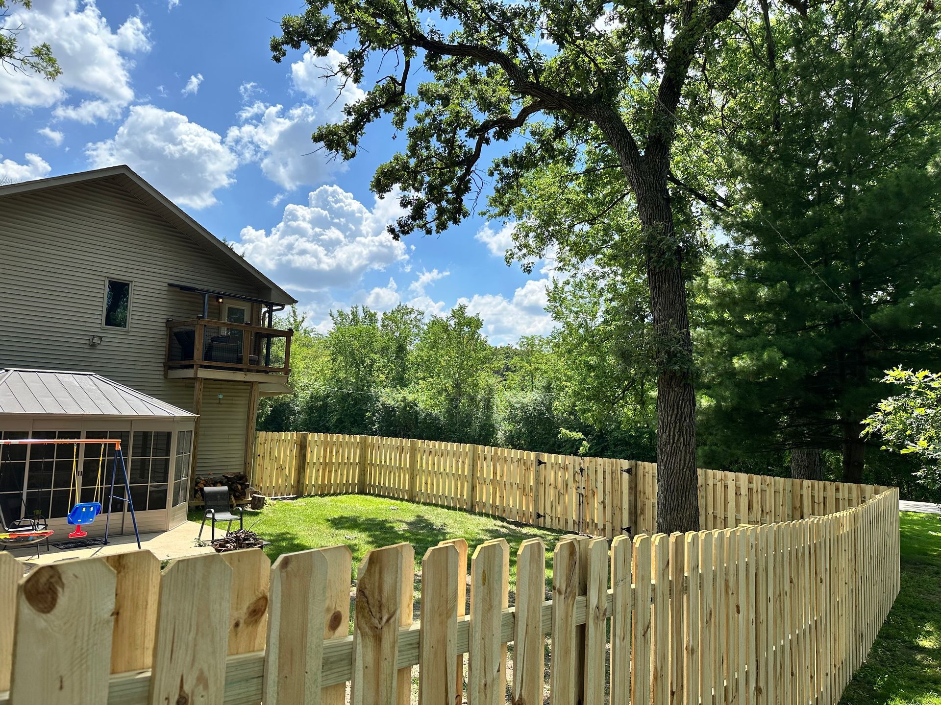 wood fence installation Illinois pressure treated pine shadowbox fencing