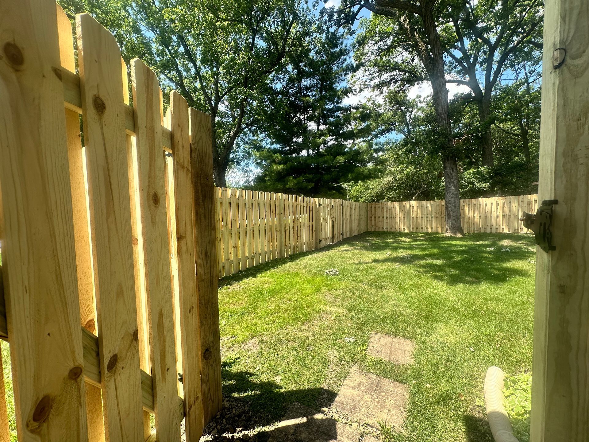 wood fence installation Illinois pressure treated pine shadowbox fencing