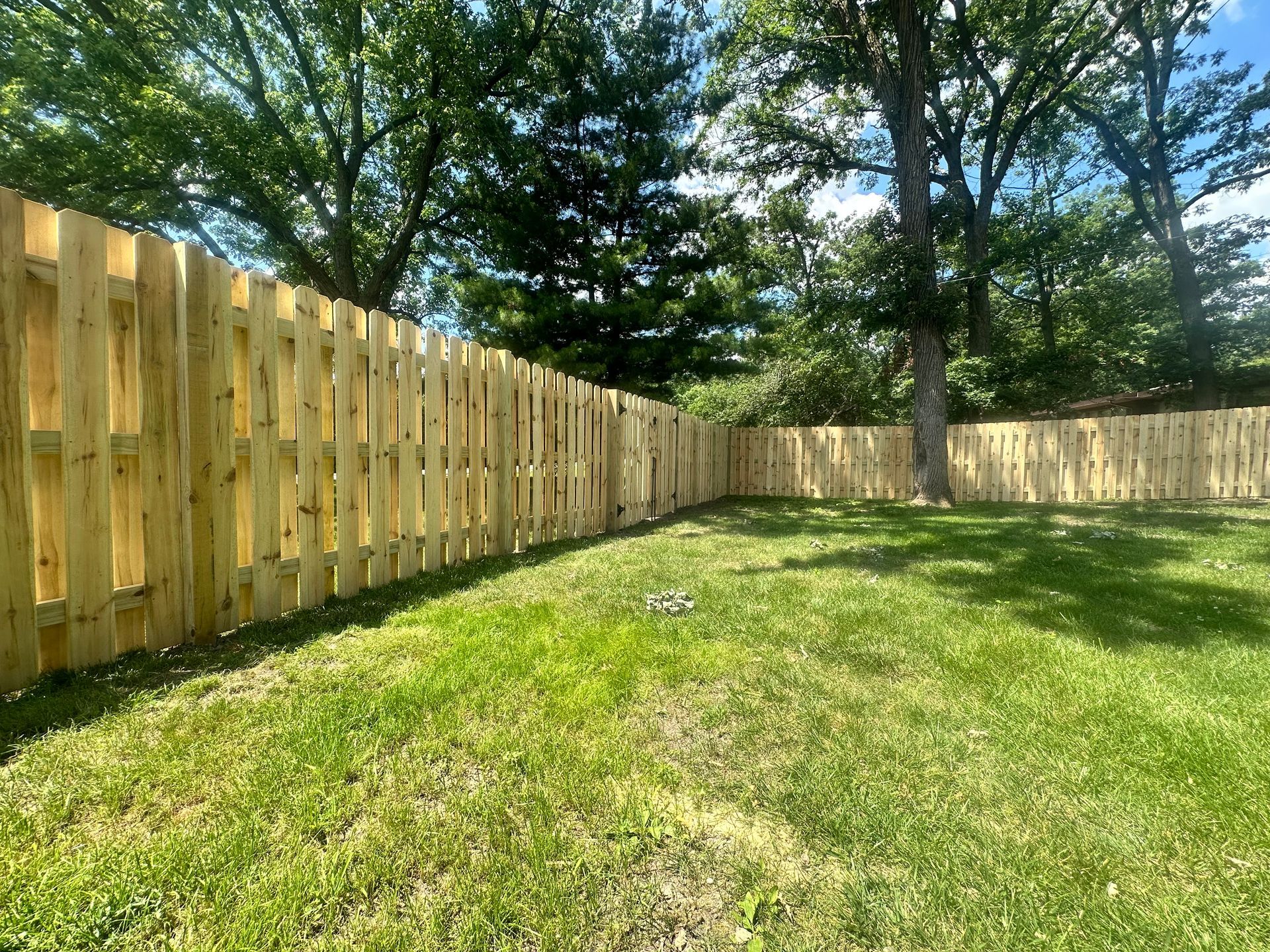 wood fence installation Illinois pressure treated pine shadowbox fencing