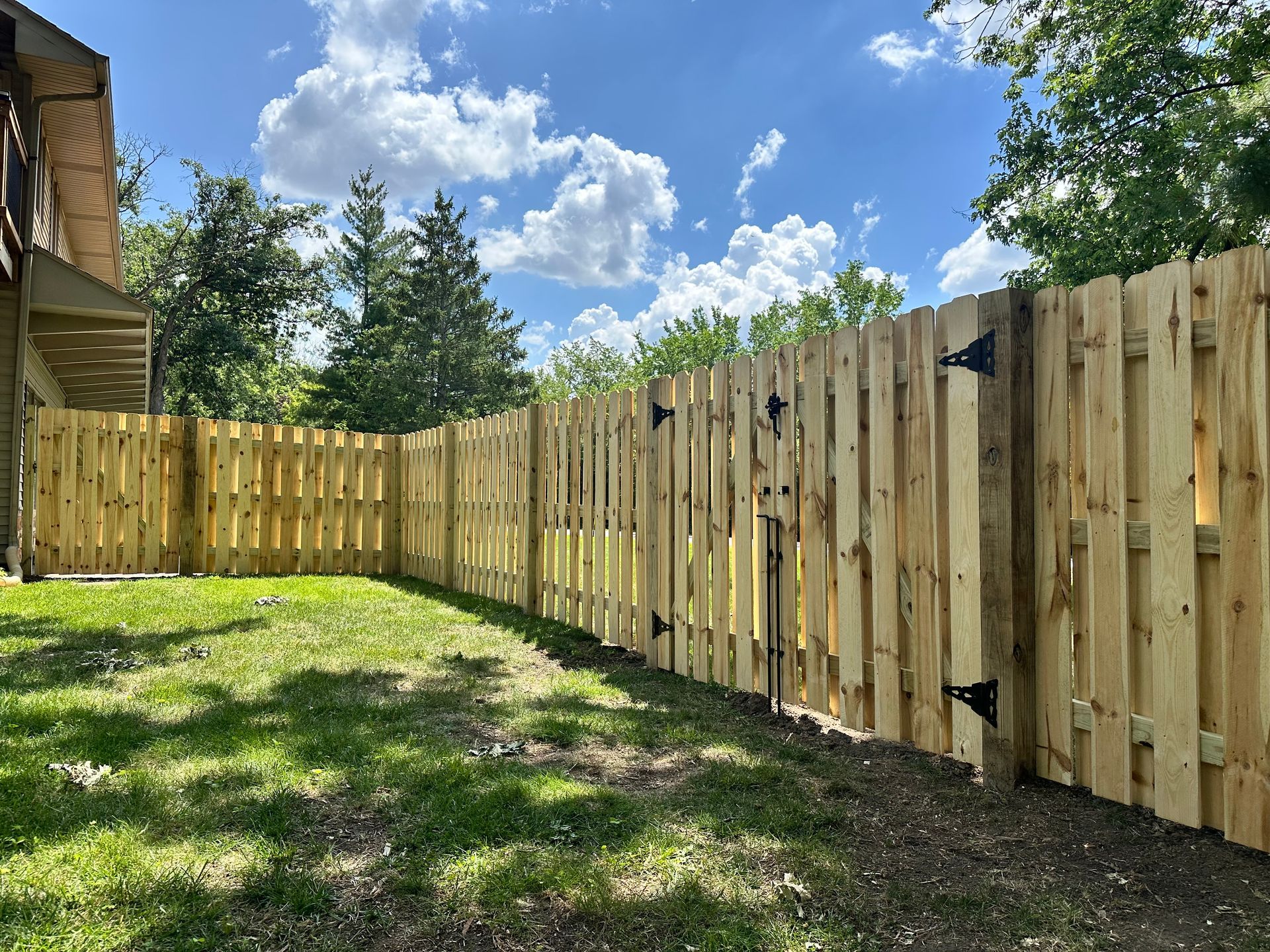 wood fence installation Illinois pressure treated pine shadowbox fencing