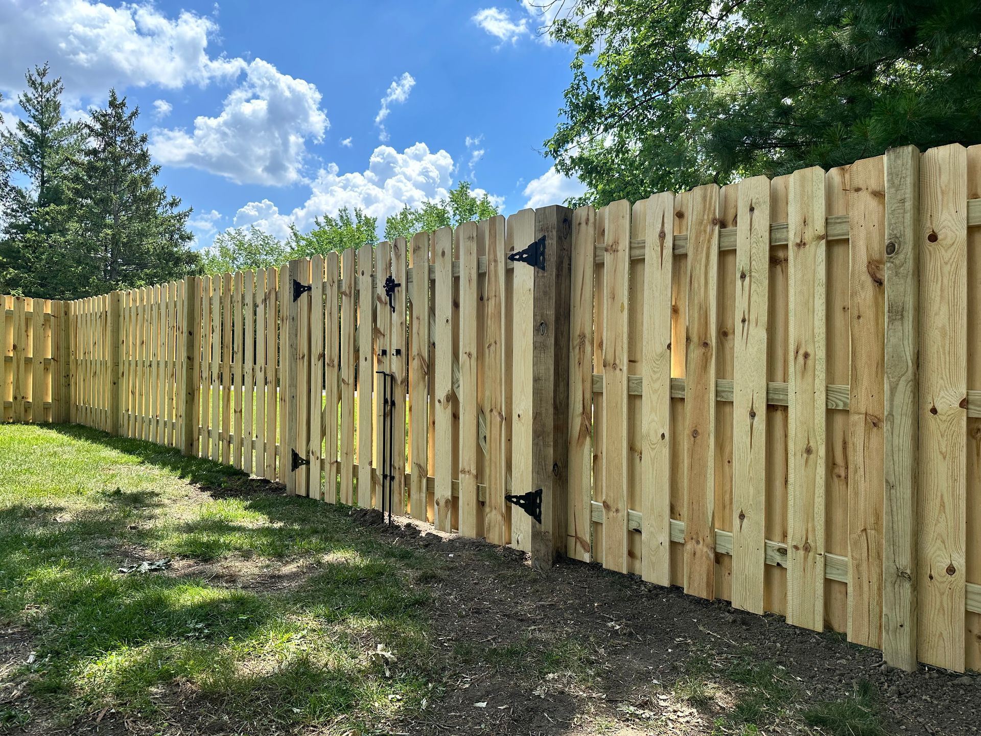 wood fence installation Illinois pressure treated pine shadowbox fencing