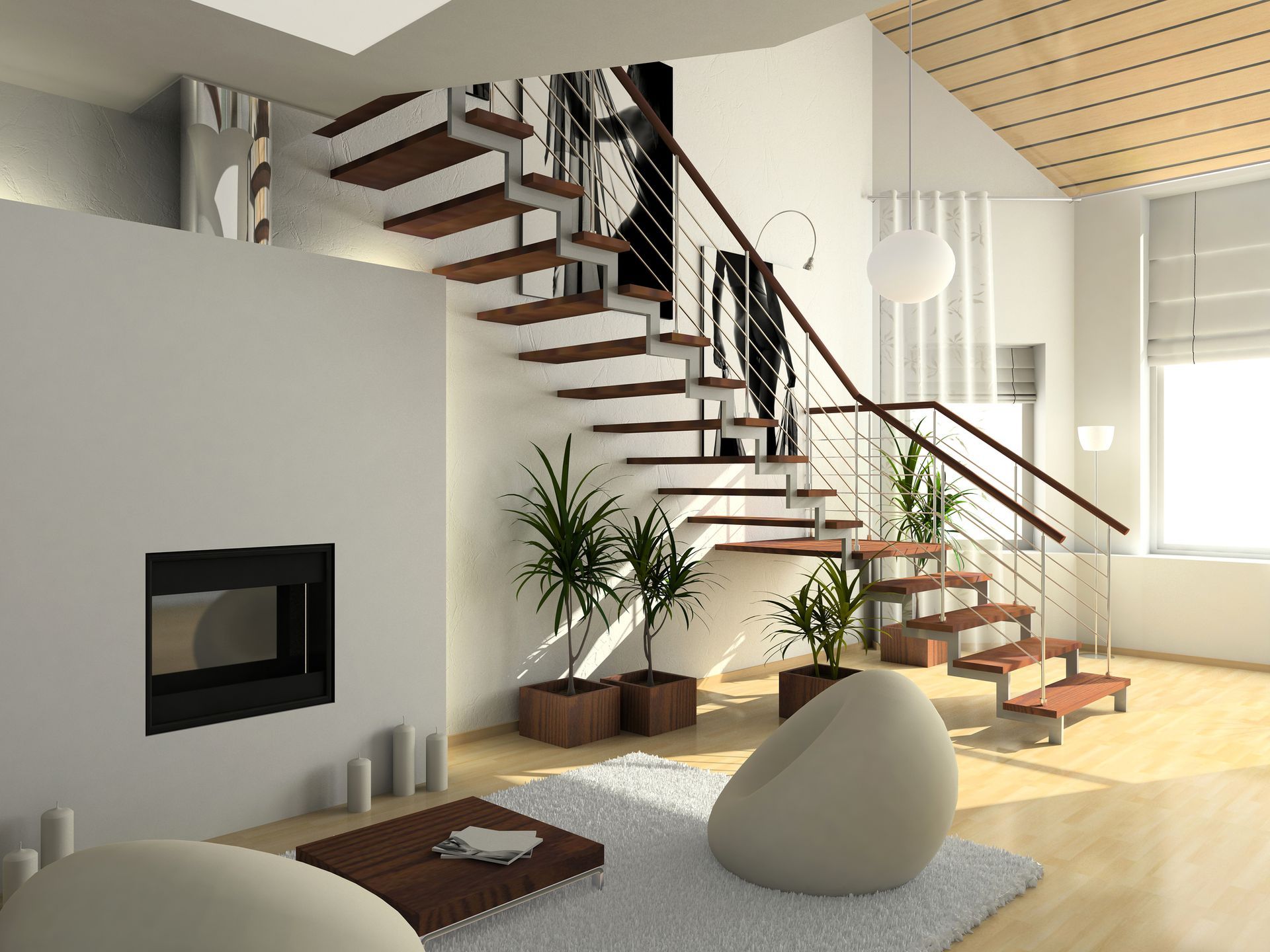 A living room with a staircase and a fireplace