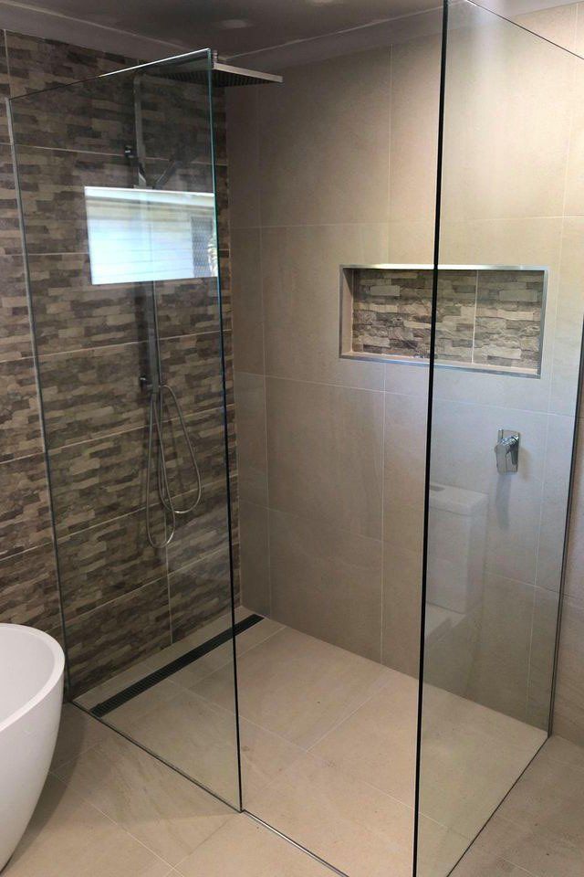 Frameless Shower Screen in Modern Bathroom — Gold Coast Shower Screens in Coombabah QLD