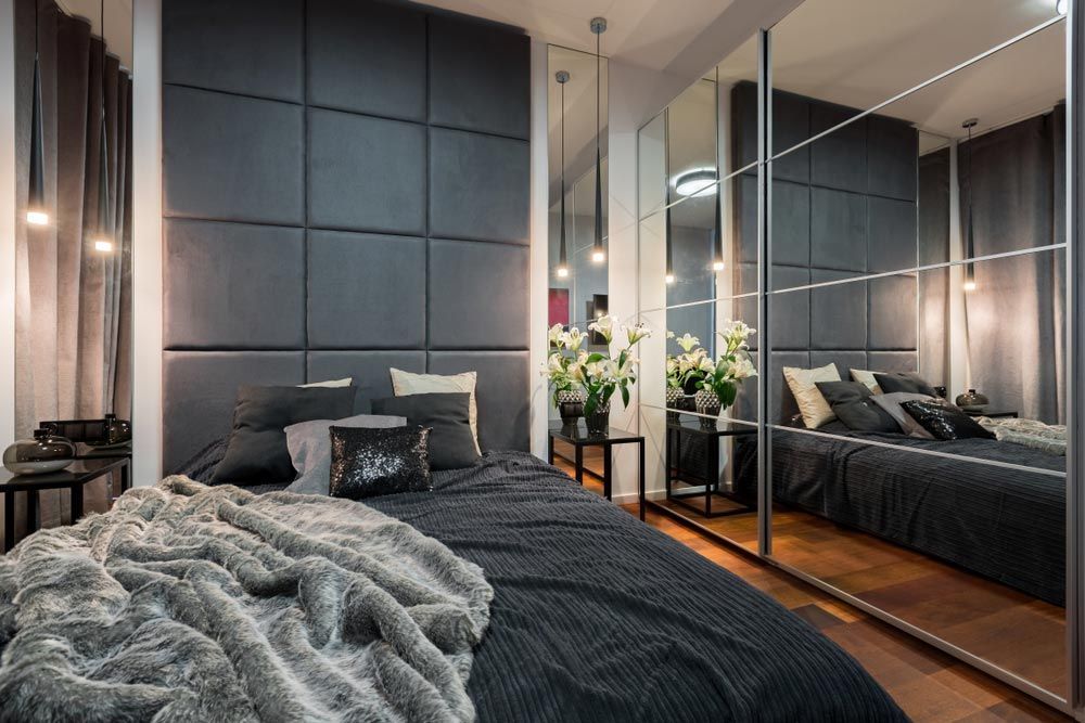 Bedroom With A Mirrored Wardrobe