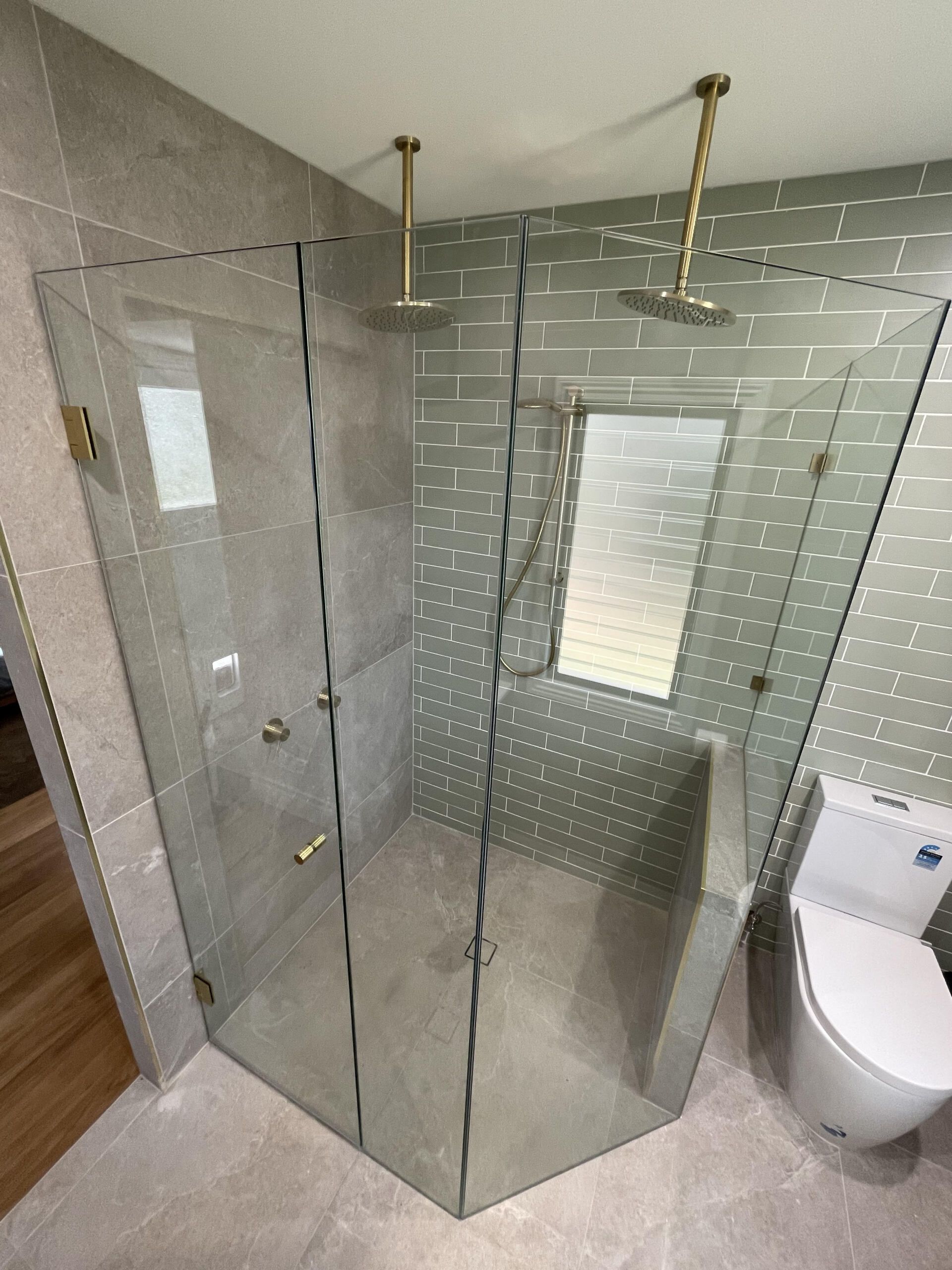 Frameless Glass Showerscreen With Hinged Door And Splayed — Shower Screens in Coombabah, QLD
