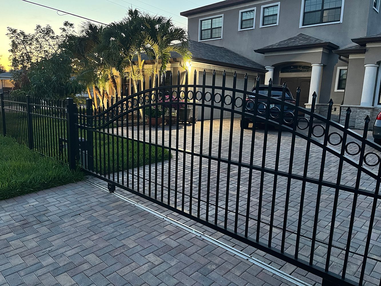 Elegant black gate at home's driveway