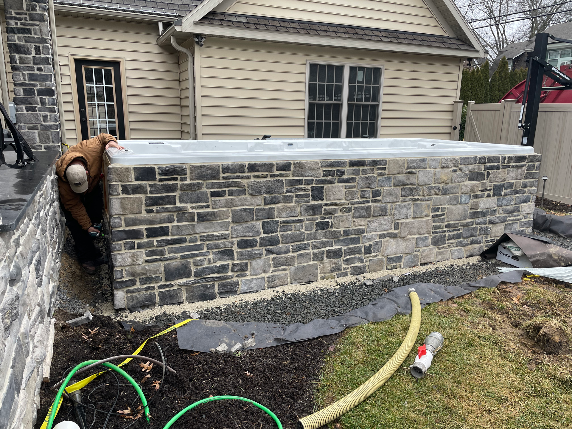 Man Fixing The Swim Spa — Mohnton, PA — Honey Spas