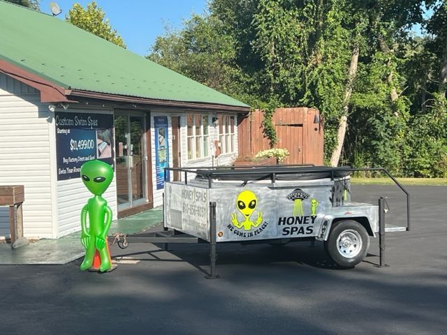 Green alien statue outside business called 