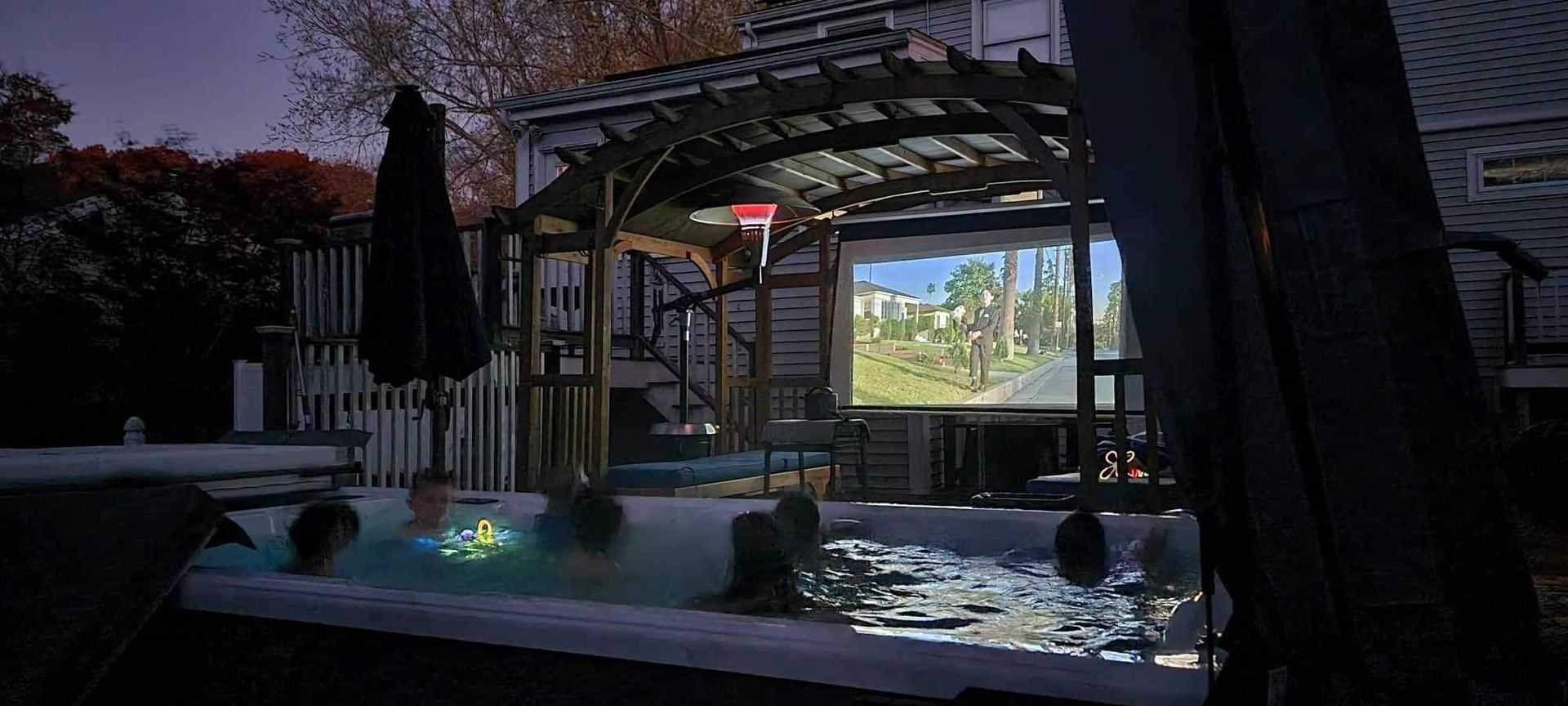 Watching a movie in swim spa — Mohnton, Pennsylvania — Honey Spas