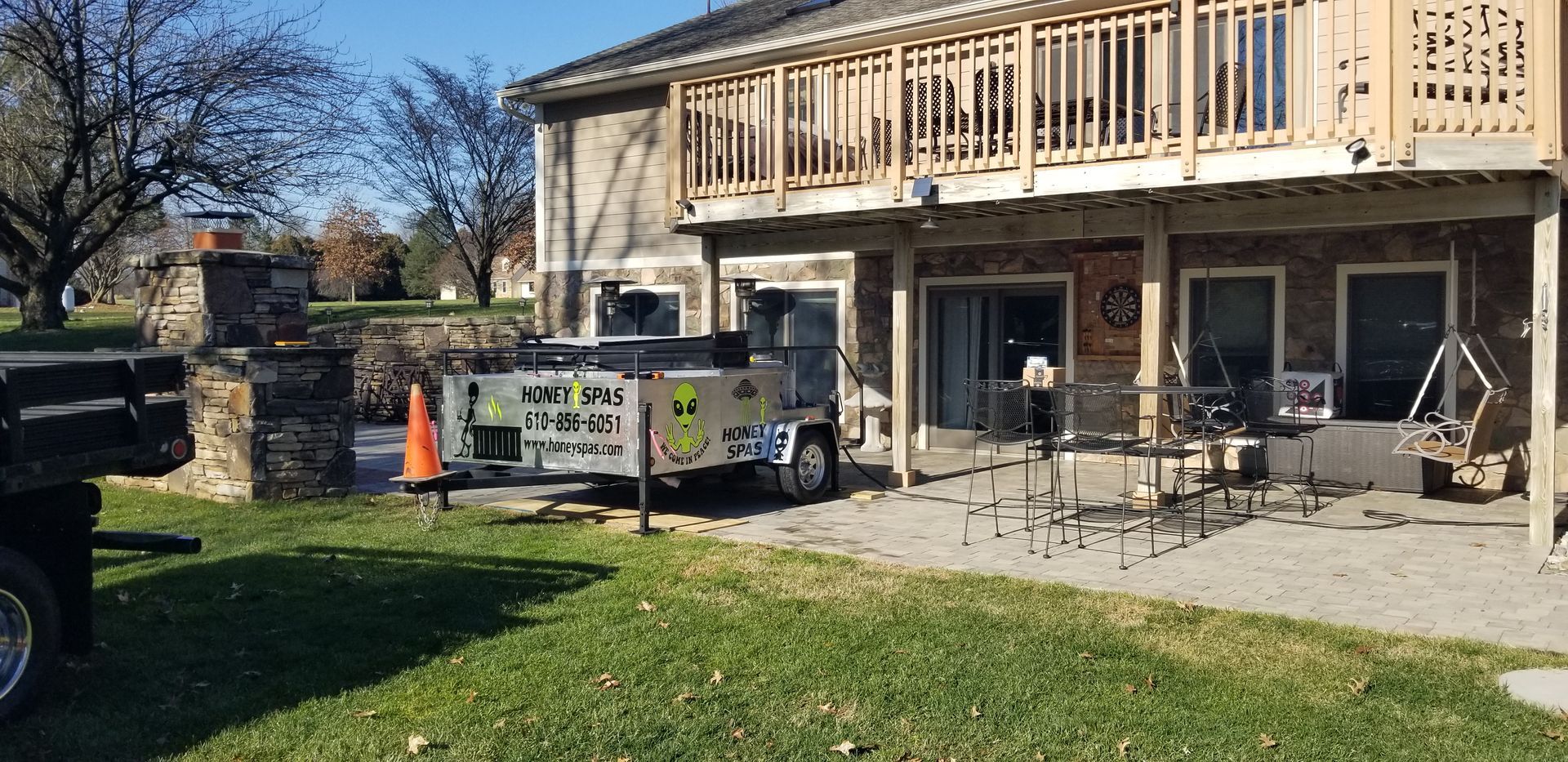 A house with a trailer that says 