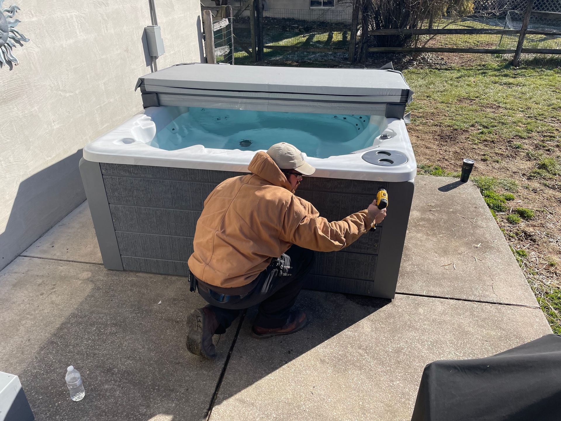 Handyman repairing a hot tub
