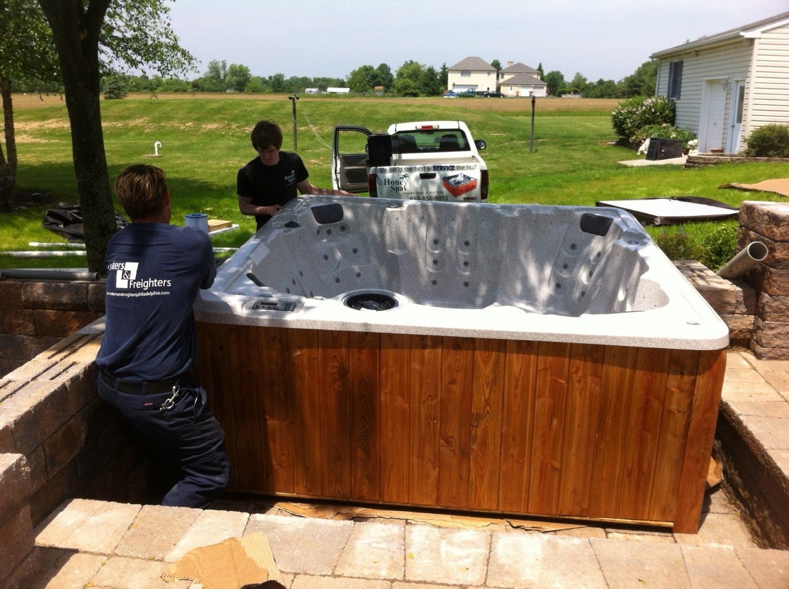 Hot Tub  Delivery — Men Installing  Hot in  Mohnton, PA
