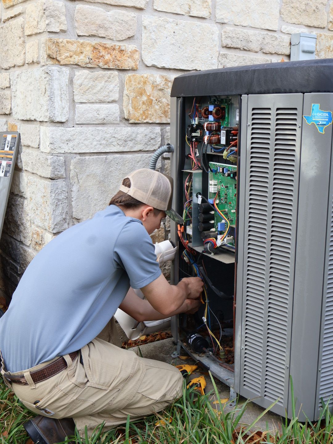 Heat pump unit operating outside a Corpus Christi home during winter to maintain efficient heating.