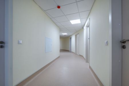 A hallway in a commercial building with new interior paint.