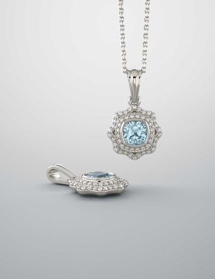 A necklace with a blue stone and diamonds on a chain.