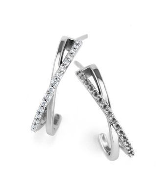 A pair of white gold hoop earrings with diamonds on a white background.
