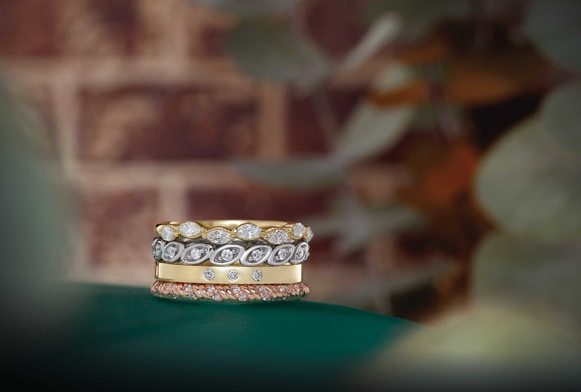 A close up of a stack of rings on a table.