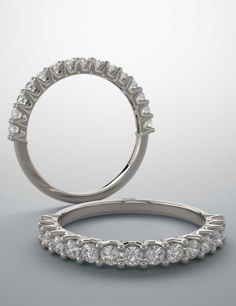 A white gold ring with a row of diamonds on it