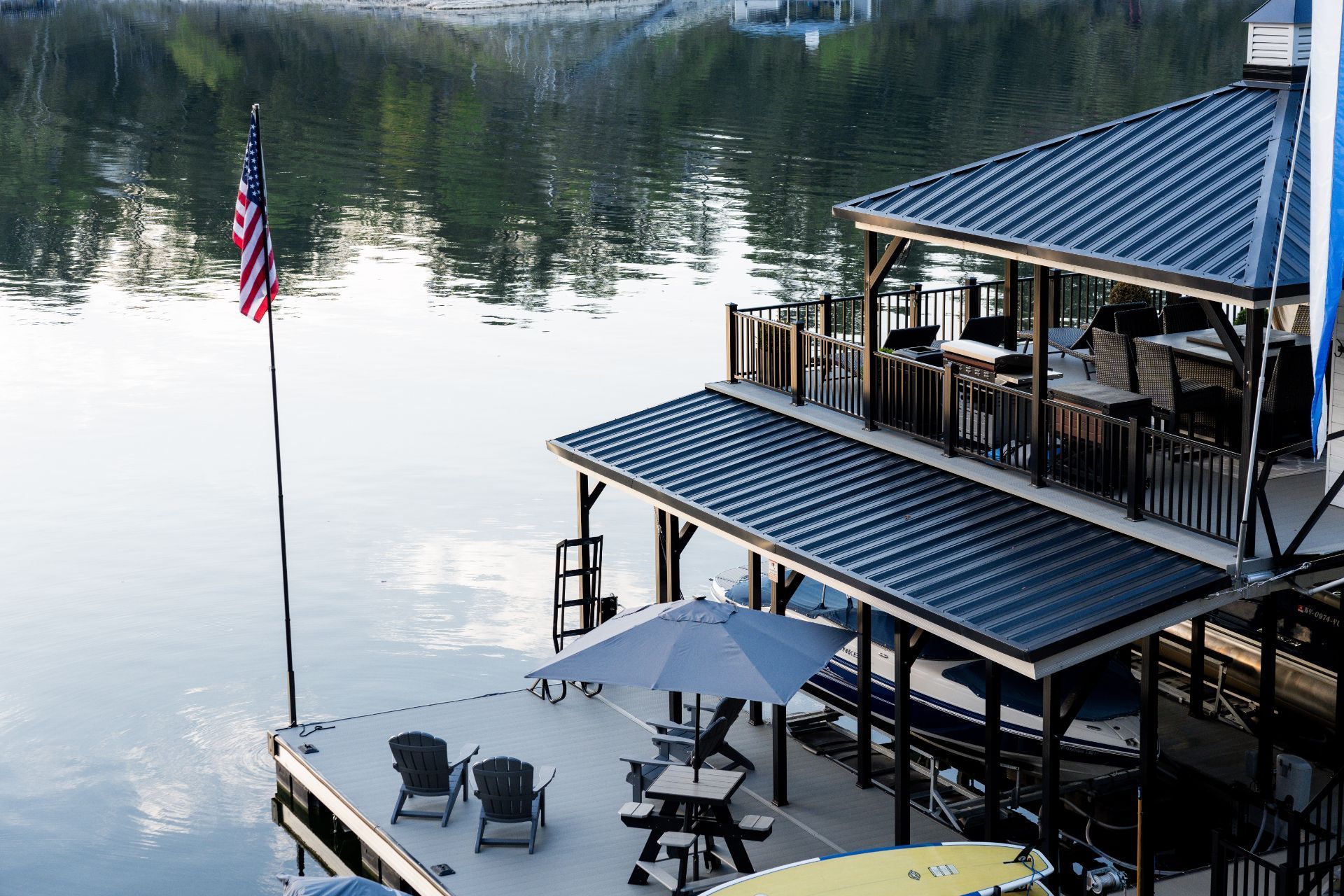 Dock with Chairs, Umbrellas and A Flag on It - Dock Solutions of Kentucky | Lexington, KY