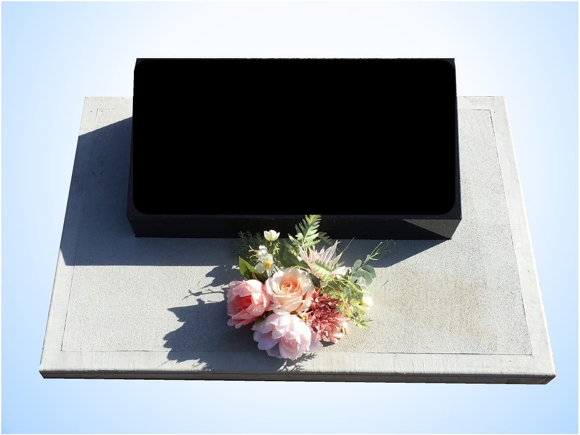 Sloper Monument With Flowers in Front — S.R. Horder Monumental Masons in Rutherford, NSW