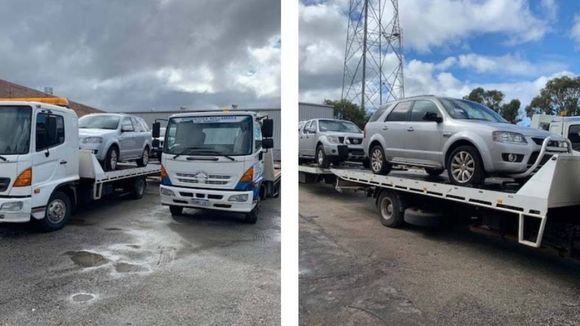 truck carrying a car