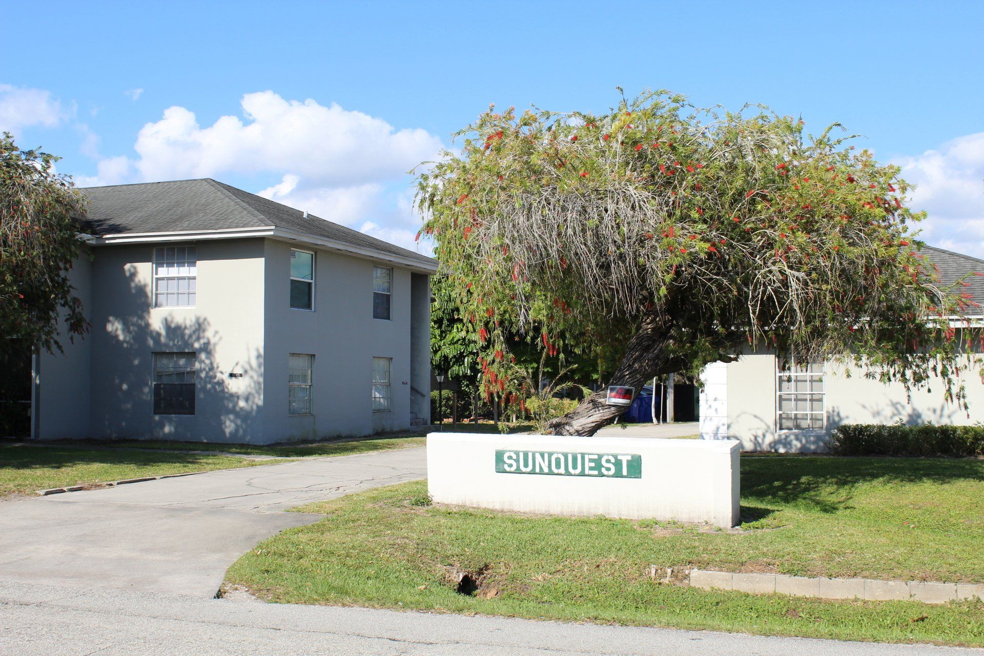 Sunquest Apartments sign