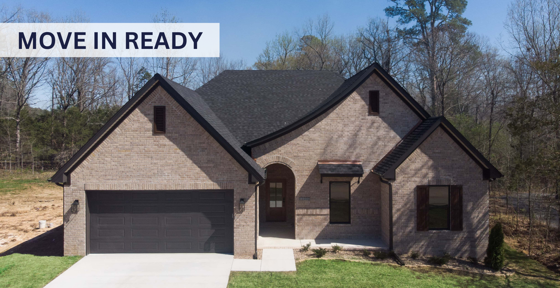 beautiful home with dark exterior and brand new construction