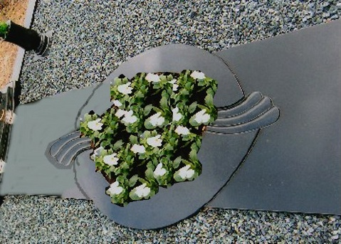 kapavietė su įrengtu gėlynu