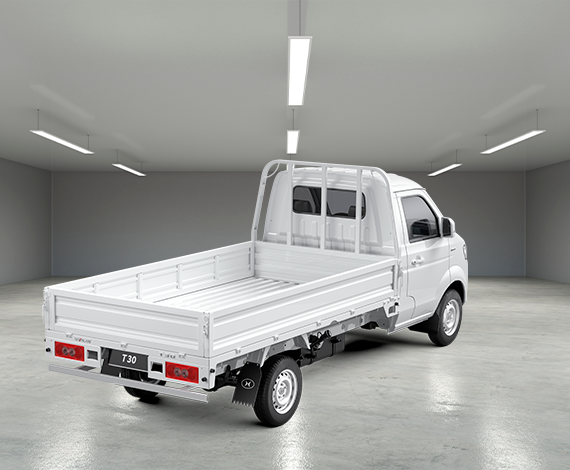 Chasis de cabina de camión comercial ligero de color blanco, visto de perfil sobre un fondo blanco.