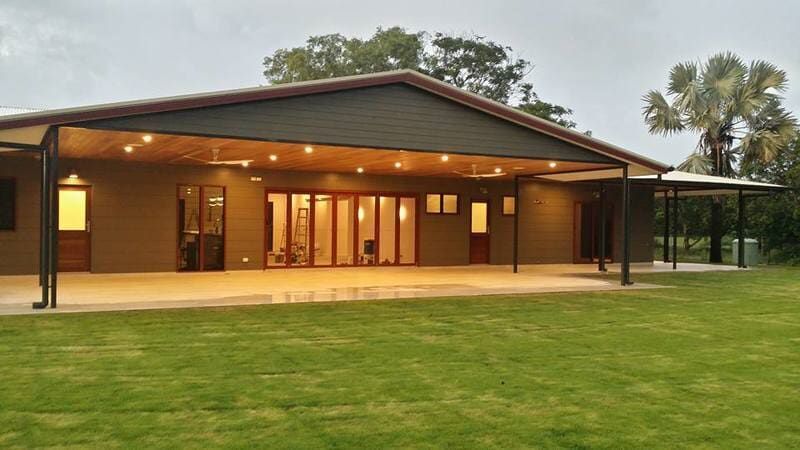 A Large House With a Covered Porch and a Lot of Windows — Darwin Glass in Yarrawonga, NT