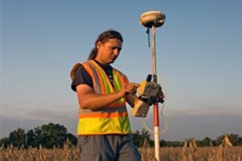 Land Surveyor working with GPS. - Land Development & Planning Engineers in Manchester, NH