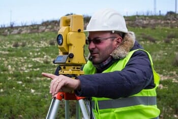 Engineer with theodolite - Land Development & Planning Engineers in Manchester, NH