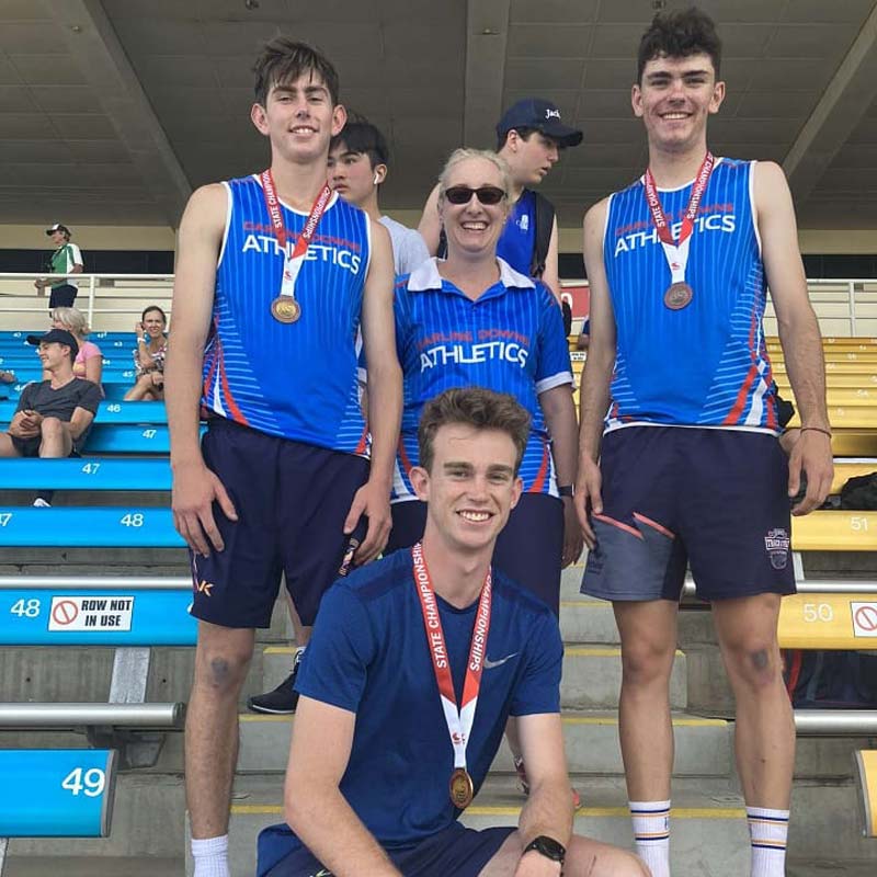 jai with medallists and supporters