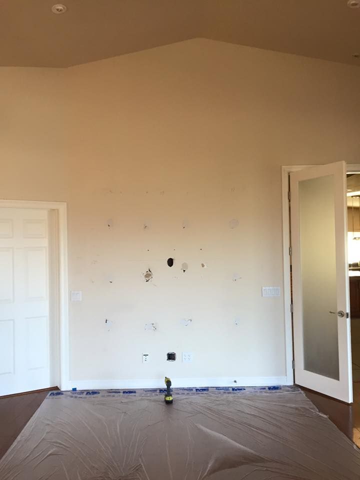 There is a drill in the middle of the room.