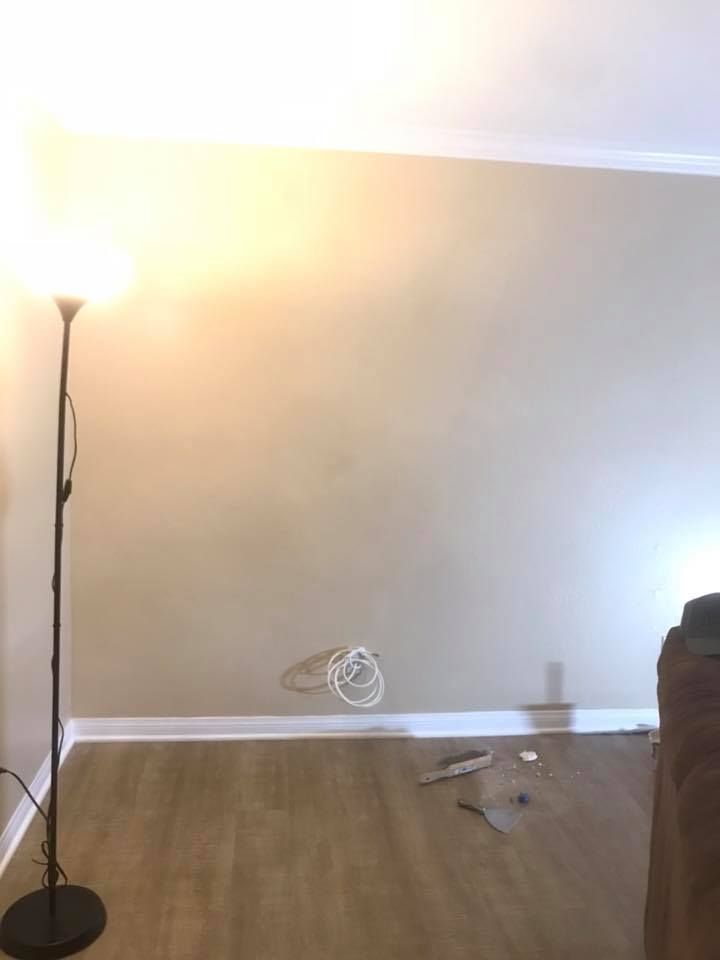 There is a lamp in the middle of the room.