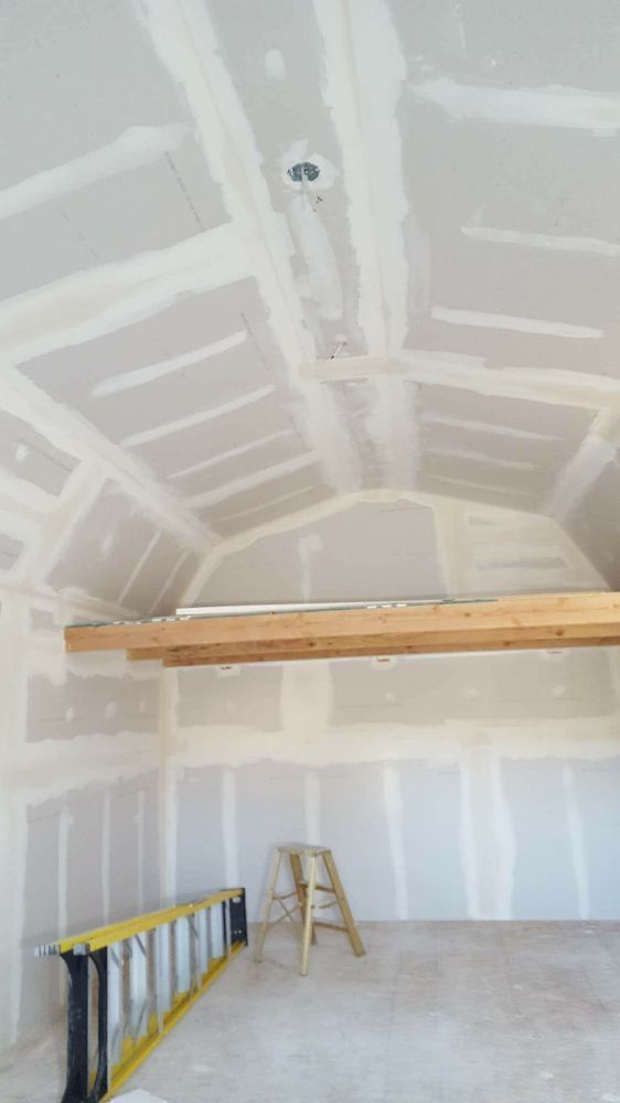 A room with a ladder and a ladder in it.
