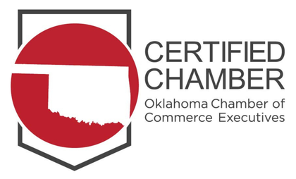 The logo for the oklahoma chamber of commerce executives is red and white.