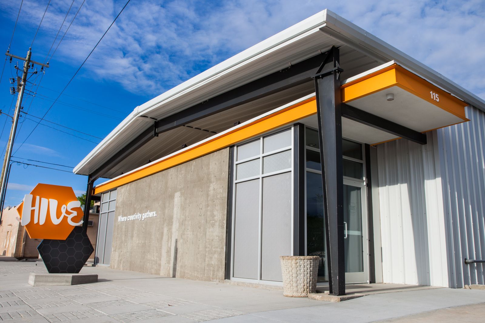 A building with a sign that says hive on it