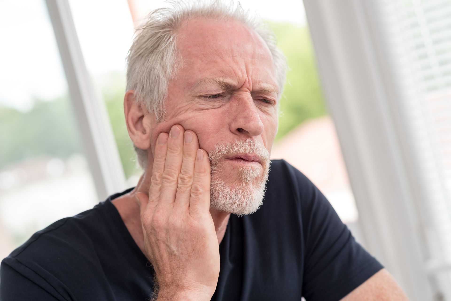 Grandfather Having Toothache - Boise, ID - Ackerman Family Dentistry